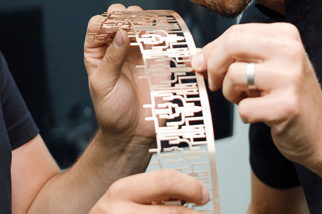 Laser cutting of precise stamped copper grid prototypes